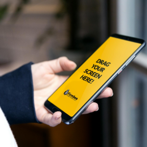 Close-up of a person holding a smartphone with a customizable screen, perfect for app demos.